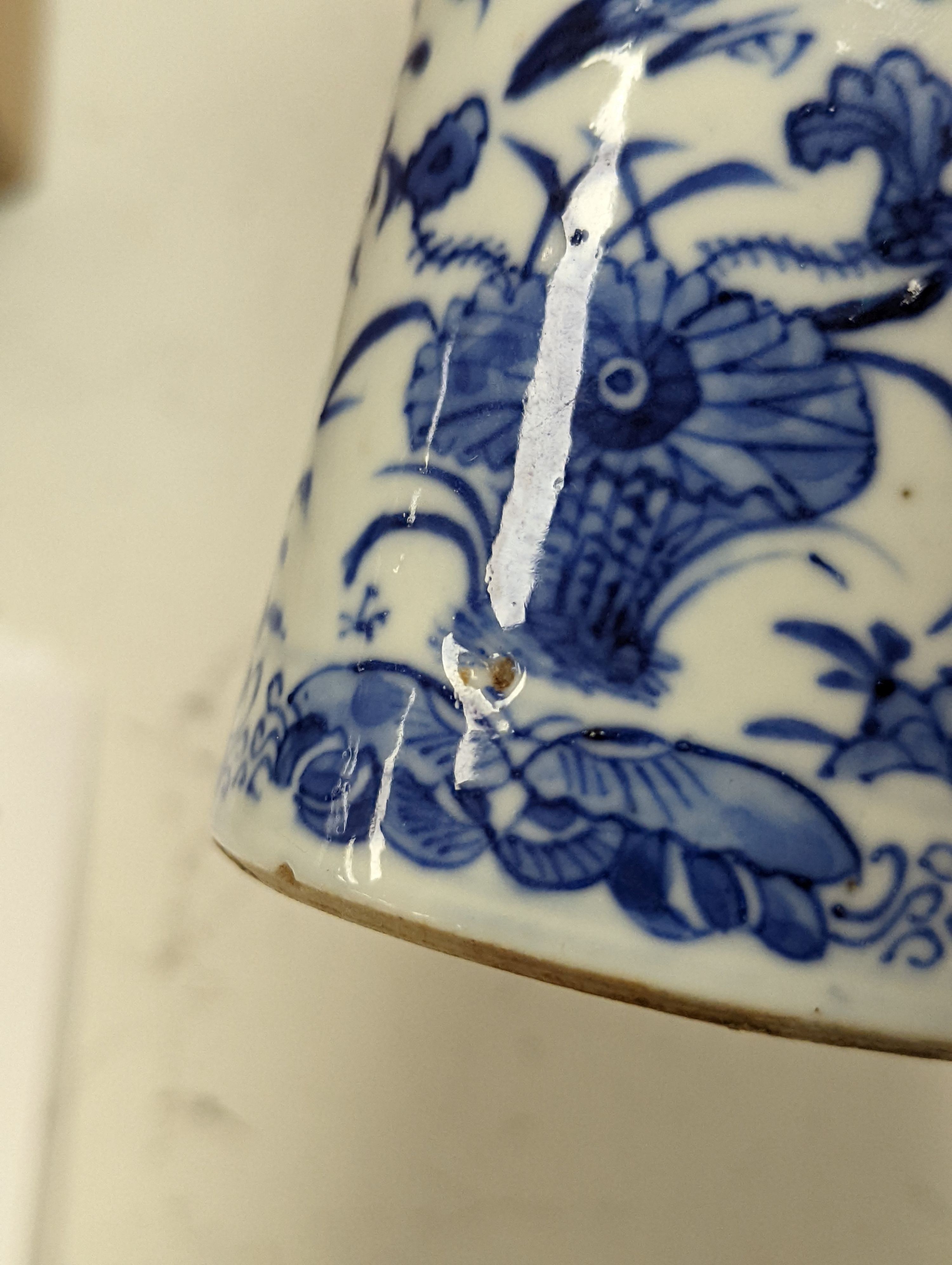 A Chinese famille rose ginger jar, a 19th century Chinese blue and white porcelain jar and cover, a blue and white cylinder vase, a small Chinese dish and orange glass vase (5)